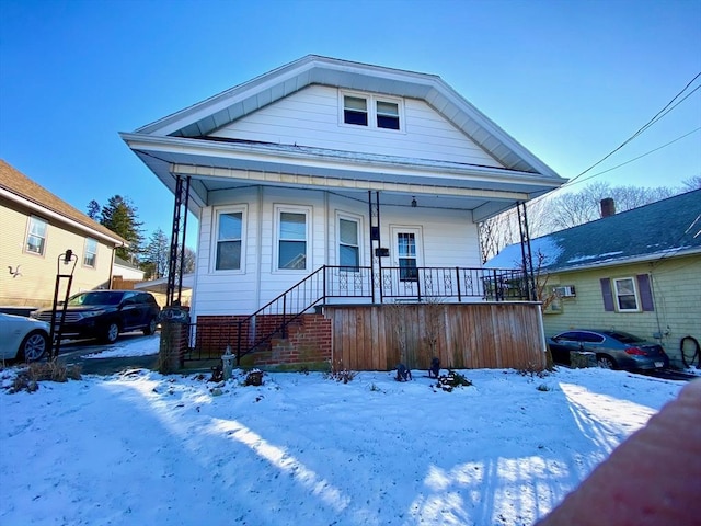 view of front of property featuring covered porch