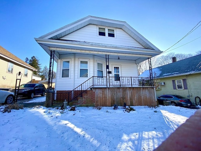 bungalow-style home featuring a porch