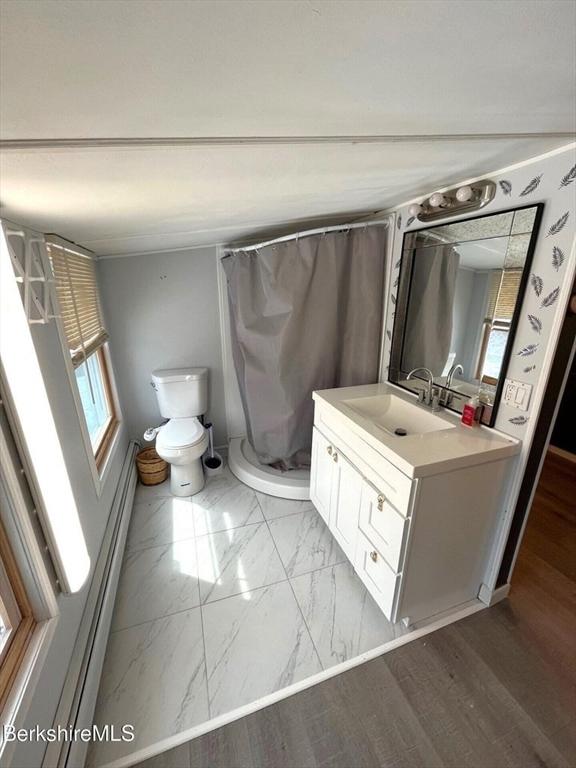 full bath featuring marble finish floor, toilet, vanity, and a shower with curtain