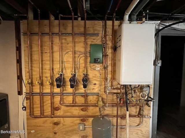 utility room with water heater