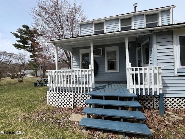 exterior space with a front lawn and covered porch