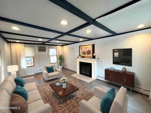 living room with a wall mounted AC, a fireplace with flush hearth, beam ceiling, a baseboard radiator, and baseboard heating