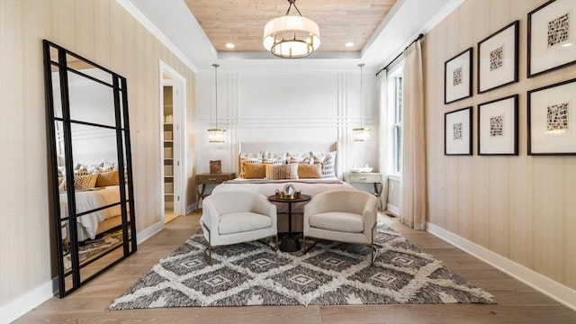 24 Owls Nest Unit 11, Plymouth, MA 02360 - bedroom with wood finished floors, wallpapered walls, and baseboards