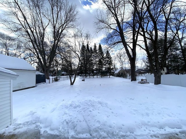 view of yard covered in snow