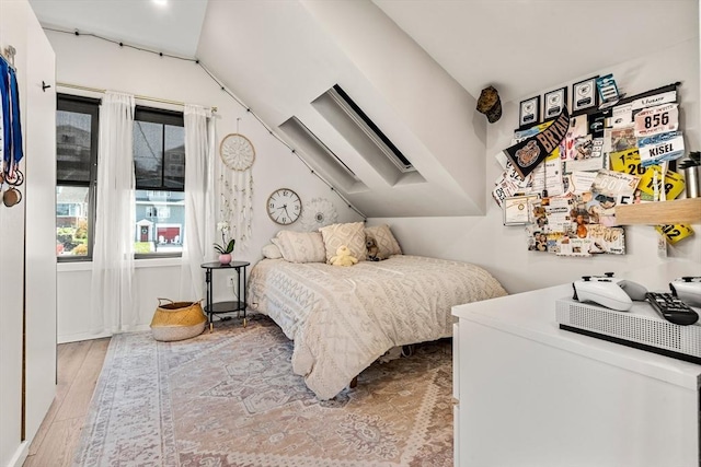bedroom featuring wood finished floors