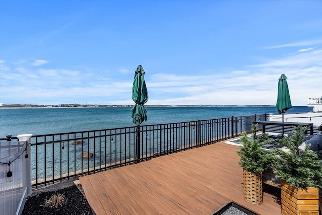 deck featuring a water view