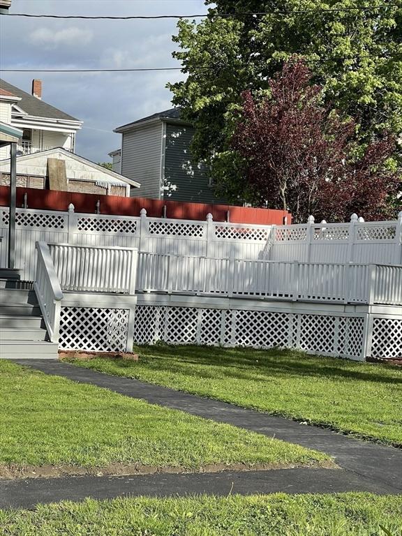 view of yard with a deck