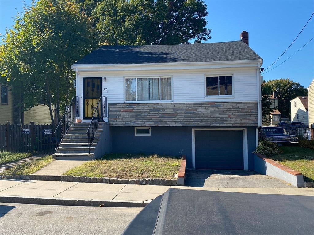 view of front of home with a garage