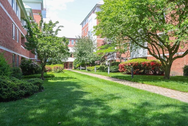 surrounding community with a lawn