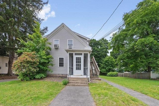 251 Main St, Ashland, MA 01721 - view of front of house with a sunroom and stairs