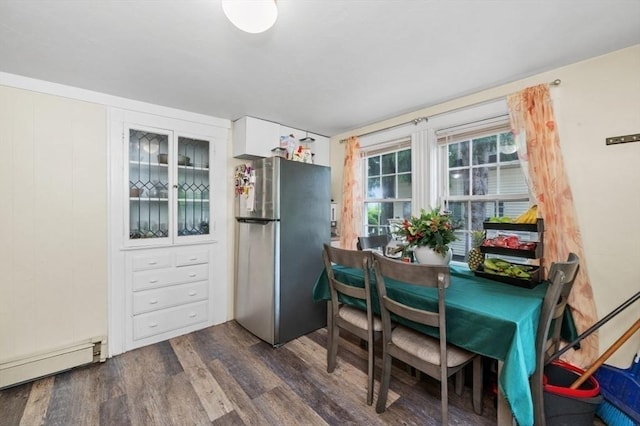 251 Main St, Ashland, MA 01721 - dining area with baseboard heating and dark wood finished floors