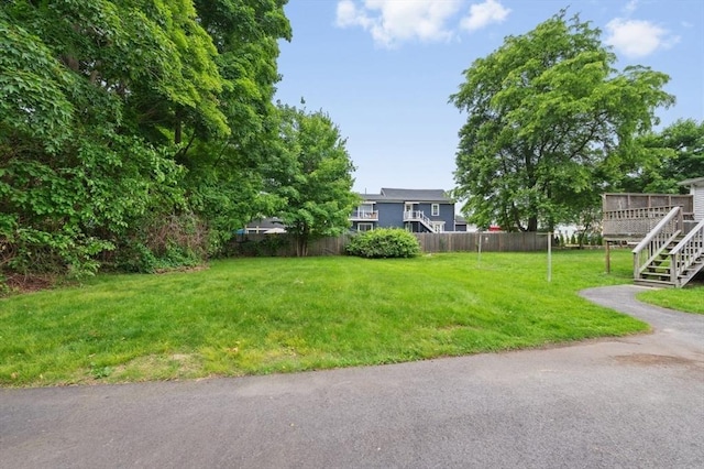 251 Main St, Ashland, MA 01721 - view of yard with a wooden deck and stairs
