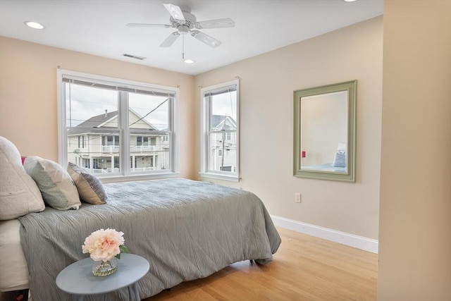 13 11th St W, Salisbury, MA 01952 - bedroom with light wood-style flooring, baseboards, recessed lighting, and ceiling fan