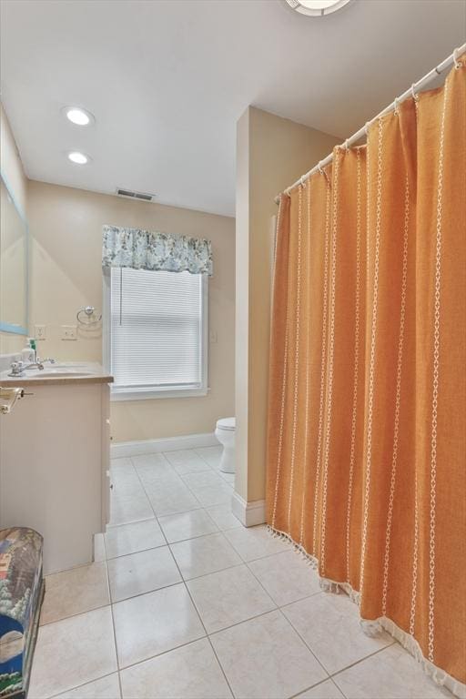 13 11th St W, Salisbury, MA 01952 - bathroom featuring toilet, tile patterned floors, vanity, baseboards, and recessed lighting