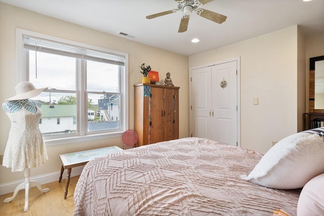 13 11th St W, Salisbury, MA 01952 - bedroom featuring light wood-type flooring, multiple windows, baseboards, a closet, and recessed lighting