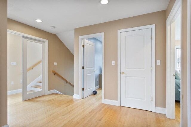 13 11th St W, Salisbury, MA 01952 - foyer entrance with light wood finished floors, baseboards, recessed lighting, and lofted ceiling
