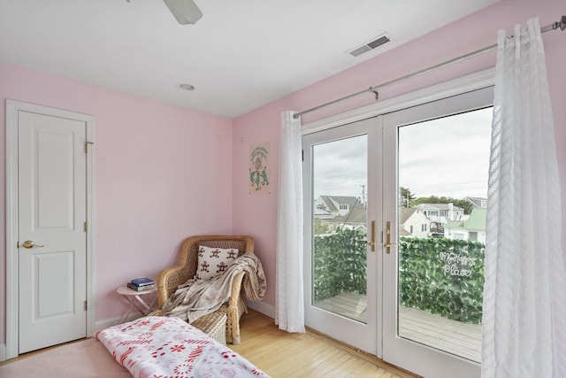 13 11th St W, Salisbury, MA 01952 - bedroom featuring french doors, access to exterior, wood finished floors, a ceiling fan, and baseboards