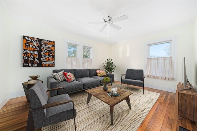 living room with hardwood / wood-style flooring and ceiling fan