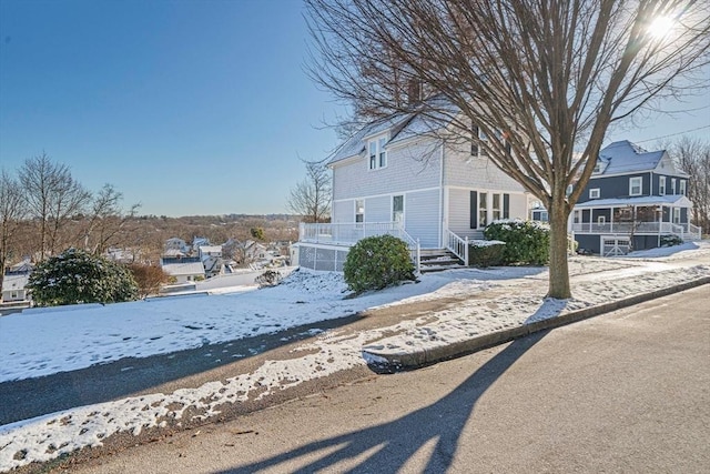 view of snow covered property