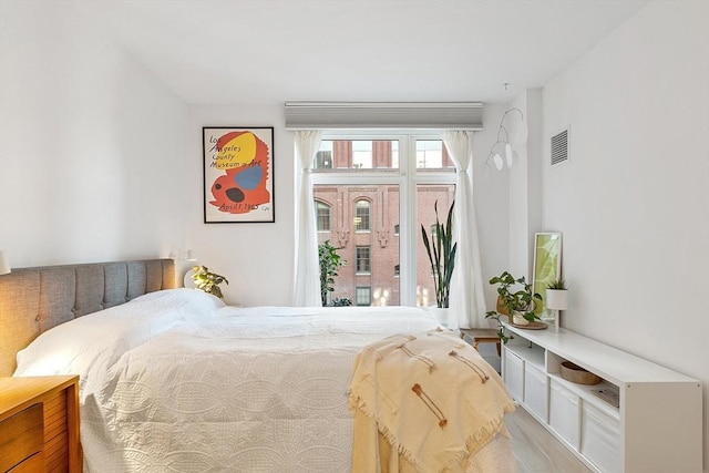 bedroom featuring visible vents