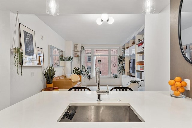 kitchen with a sink and light countertops