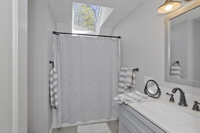 full bath featuring a shower with curtain and vanity