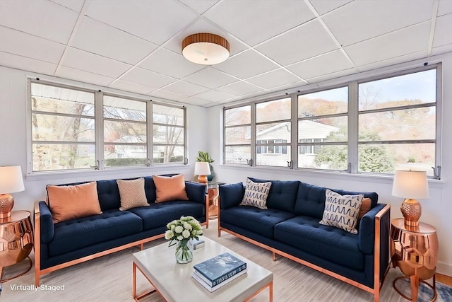 sunroom with a drop ceiling