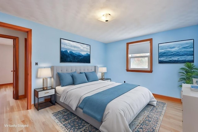 bedroom featuring light hardwood / wood-style flooring