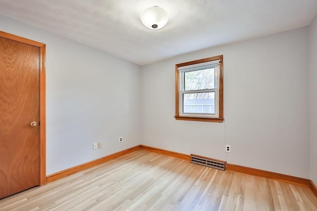 unfurnished room featuring light hardwood / wood-style flooring