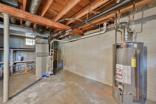 basement featuring heating unit and water heater