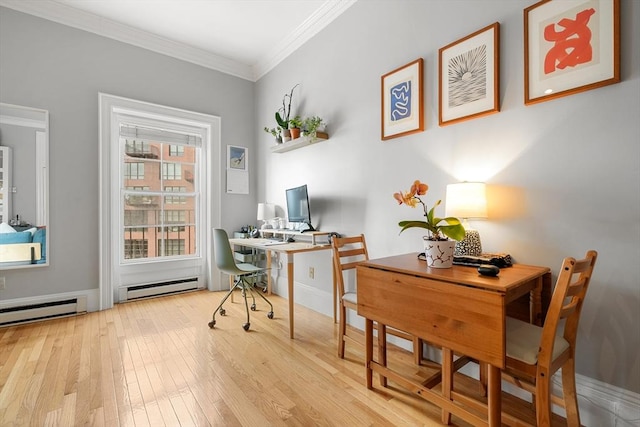 office featuring a baseboard radiator, hardwood / wood-style flooring, and ornamental molding