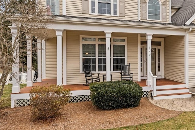 property entrance with covered porch