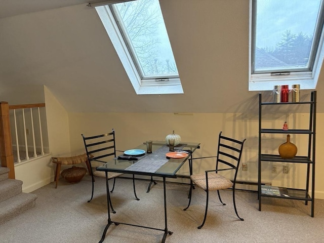 interior space with lofted ceiling with skylight