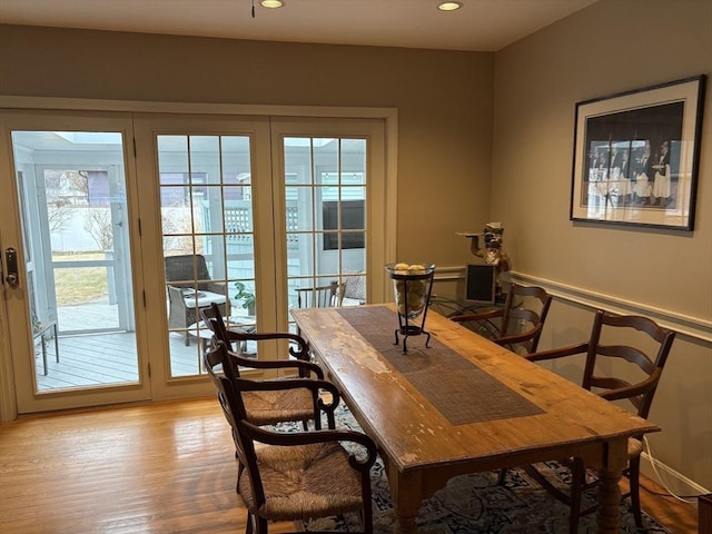 dining area with light wood-type flooring