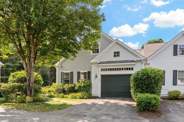 15 Berrywood Ct Unit 15, Bourne, MA 02532 - townhome / multi-family property with an attached garage and aphalt driveway