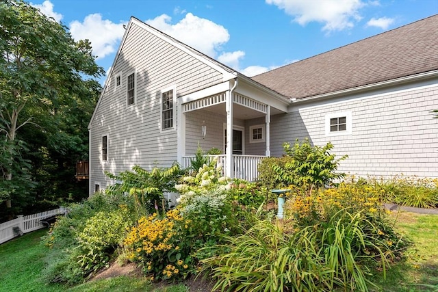 15 Berrywood Ct Unit 15, Bourne, MA 02532 - exterior space with roof with shingles