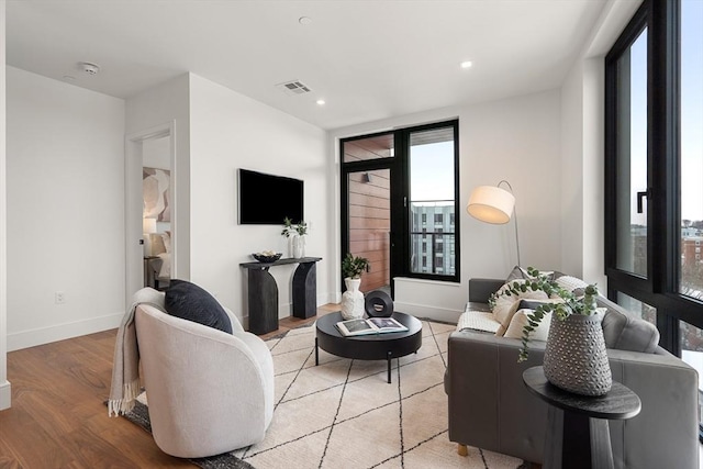 1515 Commonwealth Ave Unit 302, Boston, MA 02135 - living room featuring light wood finished floors and recessed lighting