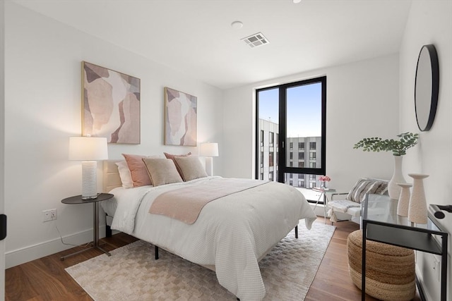 1515 Commonwealth Ave Unit 302, Boston, MA 02135 - bedroom with wood finished floors