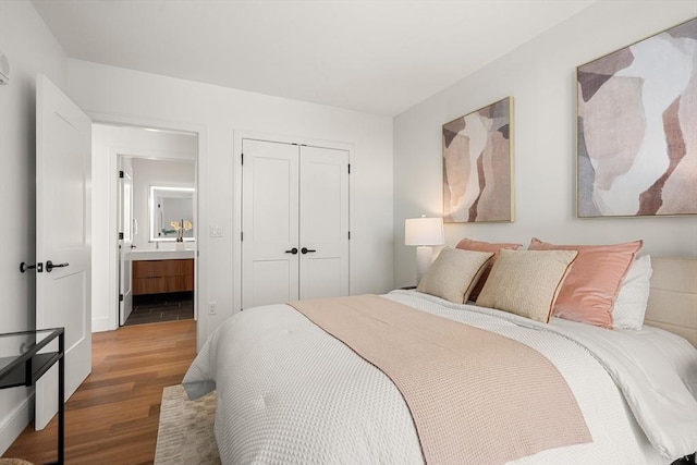 1515 Commonwealth Ave Unit 302, Boston, MA 02135 - bedroom with wood finished floors, a closet, and connected bathroom
