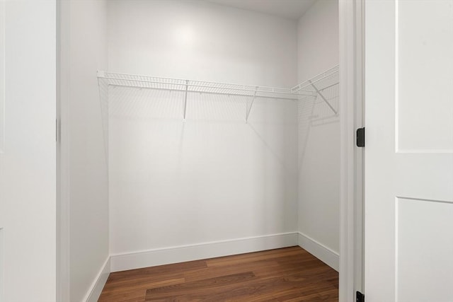 1515 Commonwealth Ave Unit 302, Boston, MA 02135 - walk in closet with wood finished floors
