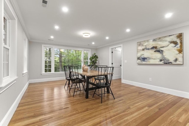 315 Maple Ave, Shrewsbury, MA 01545 - dining space featuring crown molding, light wood finished floors, recessed lighting, and baseboards