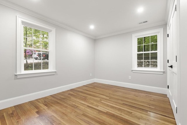 315 Maple Ave, Shrewsbury, MA 01545 - unfurnished room with crown molding, light wood-style flooring, baseboards, and recessed lighting