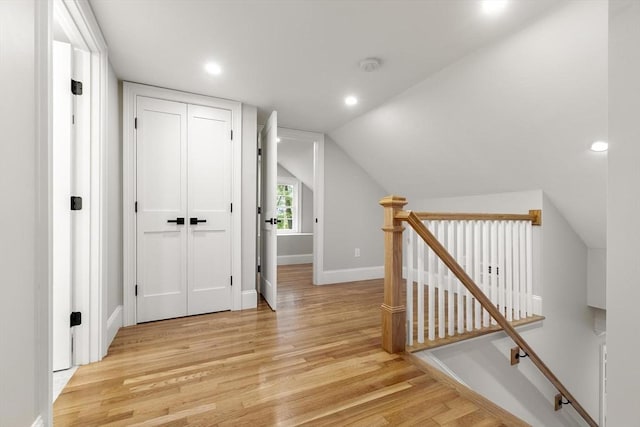 315 Maple Ave, Shrewsbury, MA 01545 - corridor featuring an upstairs landing, light wood finished floors, recessed lighting, lofted ceiling, and baseboards