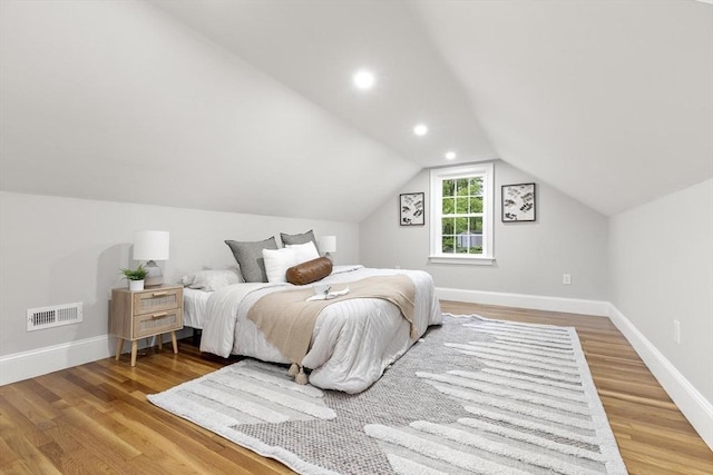 315 Maple Ave, Shrewsbury, MA 01545 - bedroom with wood finished floors, baseboards, lofted ceiling, and recessed lighting