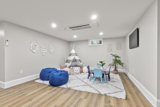 315 Maple Ave, Shrewsbury, MA 01545 - game room featuring wood finished floors, recessed lighting, and baseboards