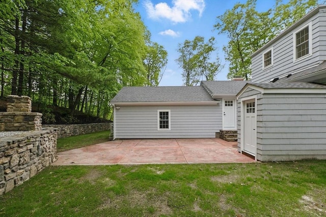 315 Maple Ave, Shrewsbury, MA 01545 - view of grassy yard with a patio and entry steps
