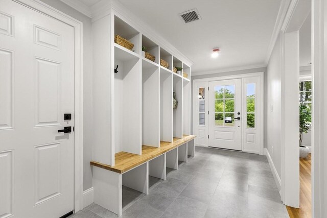 315 Maple Ave, Shrewsbury, MA 01545 - mudroom featuring healthy amount of natural light, ornamental molding, and baseboards