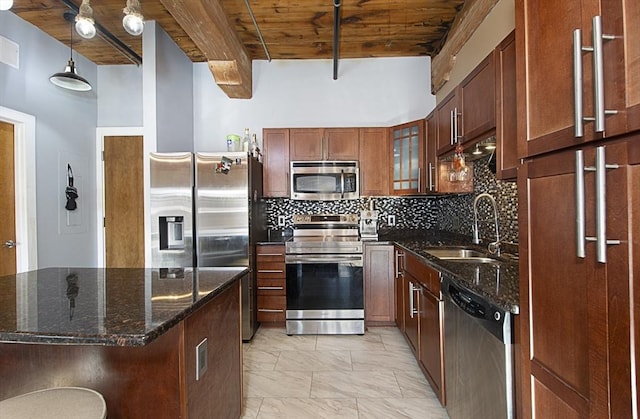 kitchen with sink, wood ceiling, hanging light fixtures, beamed ceiling, and stainless steel appliances