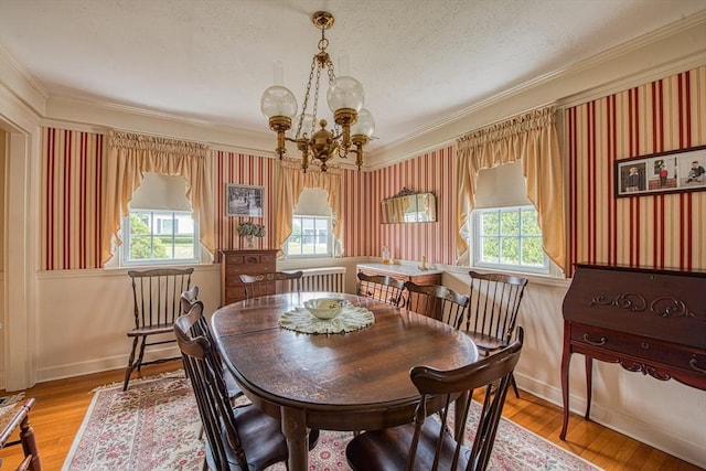 27 Carrlyn Rd, Brockton, MA 02301 - dining area featuring a chandelier, crown molding, and a wealth of natural light