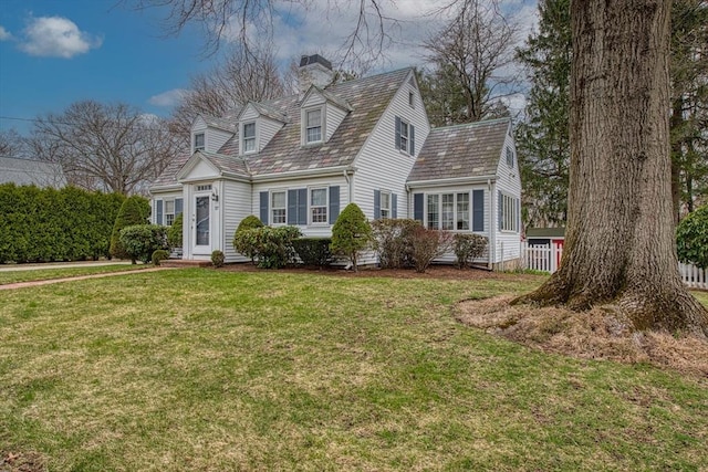 27 Carrlyn Rd, Brockton, MA 02301 - cape cod home featuring a front yard and a chimney